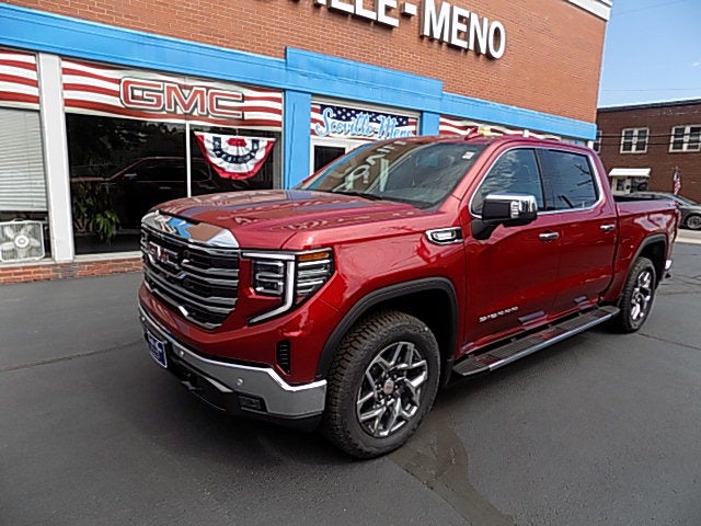 2026 GMC Sierra 1500 SLT in Volcanic Red Tintcoat — front three-quarter view